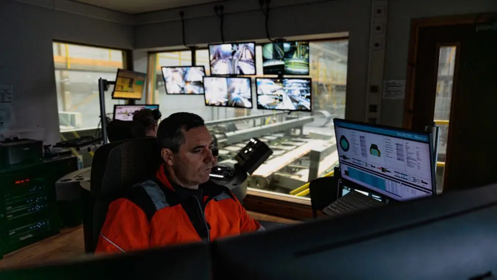 Operator at the sawmill control desk at GP Wood