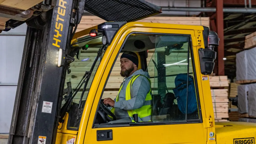 Forklift driver moving timber at the GP Wood sawmill